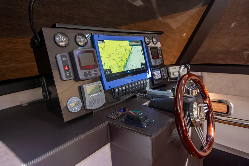 Slide: The Image of Control panel of 2019 Monachus 45 Issa yacht with navigation and steering systems. - 17