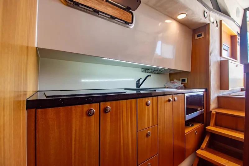 Slide: The Image of Luxurious wooden kitchen interior of 2019 Monachus 45 Issa yacht. - 18