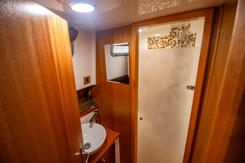 Slide: The Image of Luxurious bathroom interior of 2019 Monachus 45 Issa yacht with wooden finishes. - 24