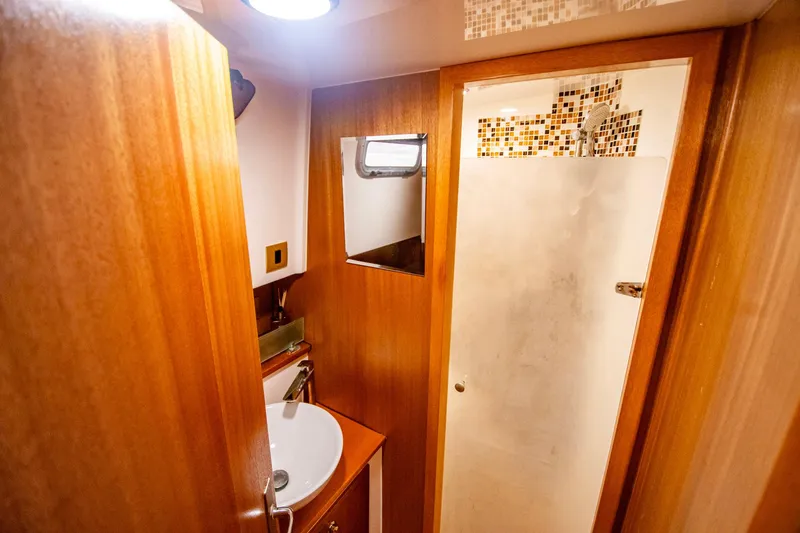 Slide: The Image of Luxurious bathroom interior of 2019 Monachus 45 Issa yacht with wooden finishes. - 25