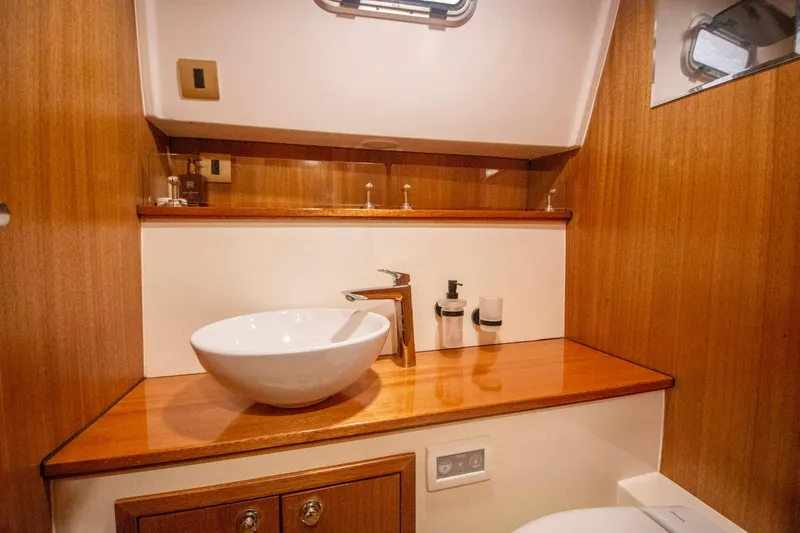Slide: The Image of Luxurious wooden bathroom interior on 2019 Monachus 45 Issa yacht. - 27
