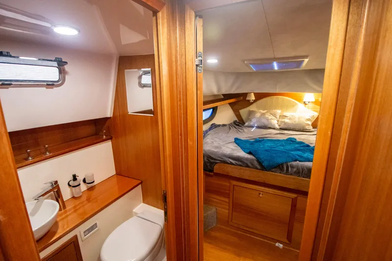 Slide: The Image of Luxurious interior of 2019 Monachus 45 Issa yacht featuring cozy bedroom and modern bathroom. - 28