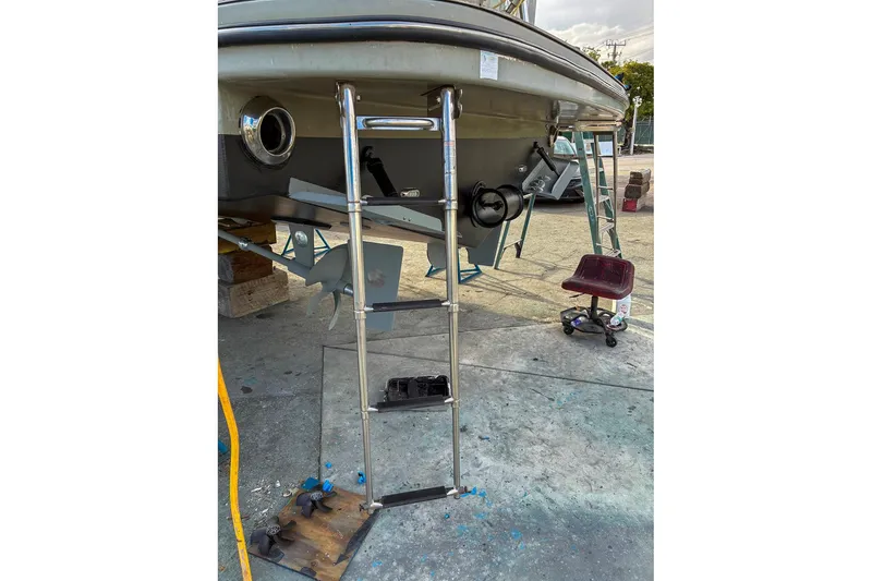 Slide: The Image of Rear view of 2019 Monachus 45 Issa yacht with ladder and propeller visible. - 34