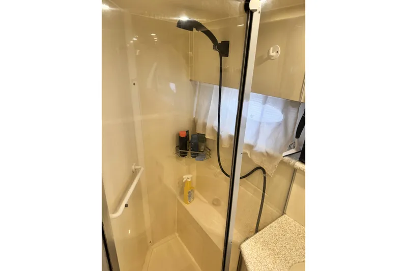 Slide: The Image of Shower area in 2000 Carver 406 Aft Cabin Motor Yacht with modern fixtures. - 21