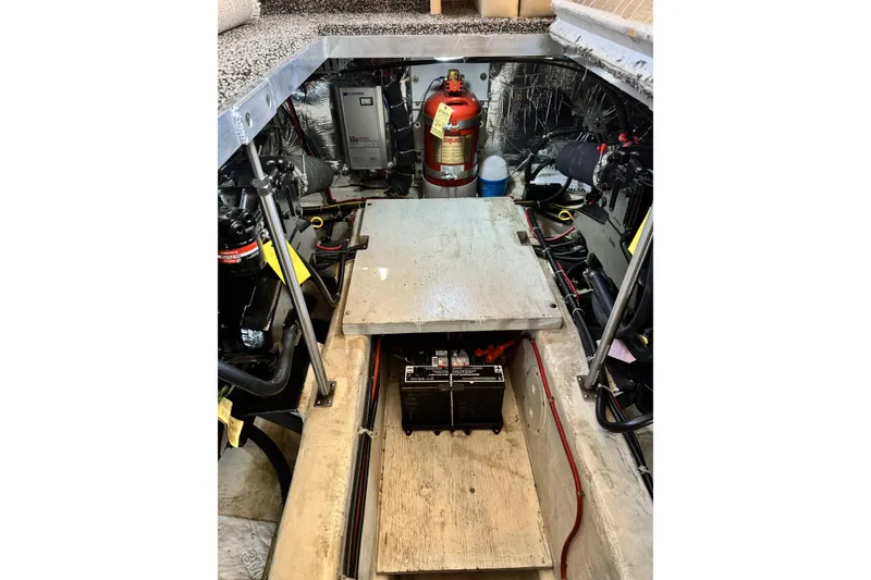 Slide: The Image of Engine room of 2000 Carver 406 Aft Cabin Motor Yacht with visible equipment and wiring. - 22