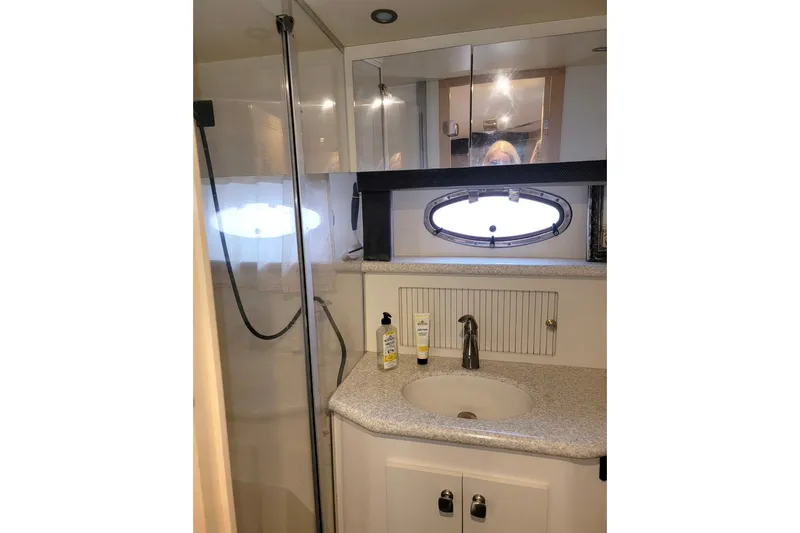 Slide: The Image of Bathroom interior of 2000 Carver 406 Aft Cabin Motor Yacht with shower and sink. - 42