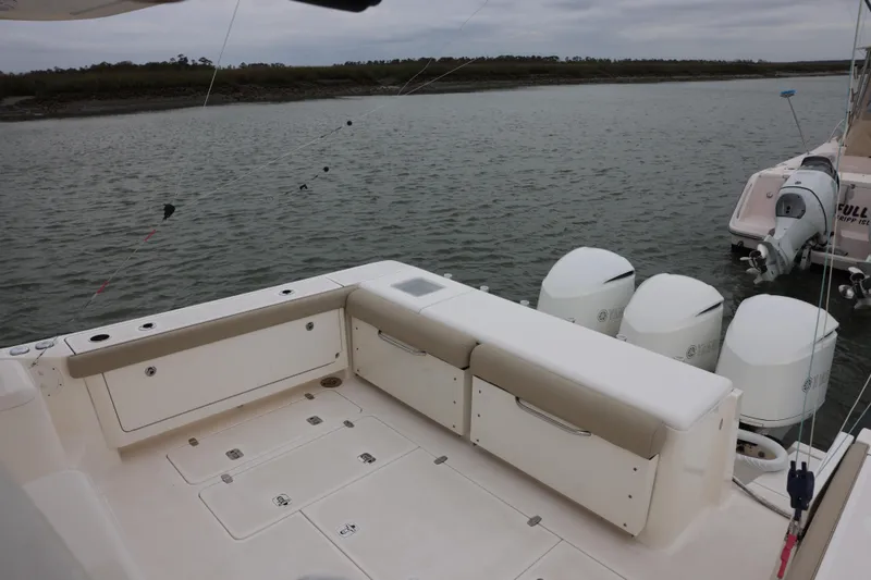 Slide: The Image of Yamaha outboard motor on 2015 Pursuit OS 385 Offshore boat. - 10