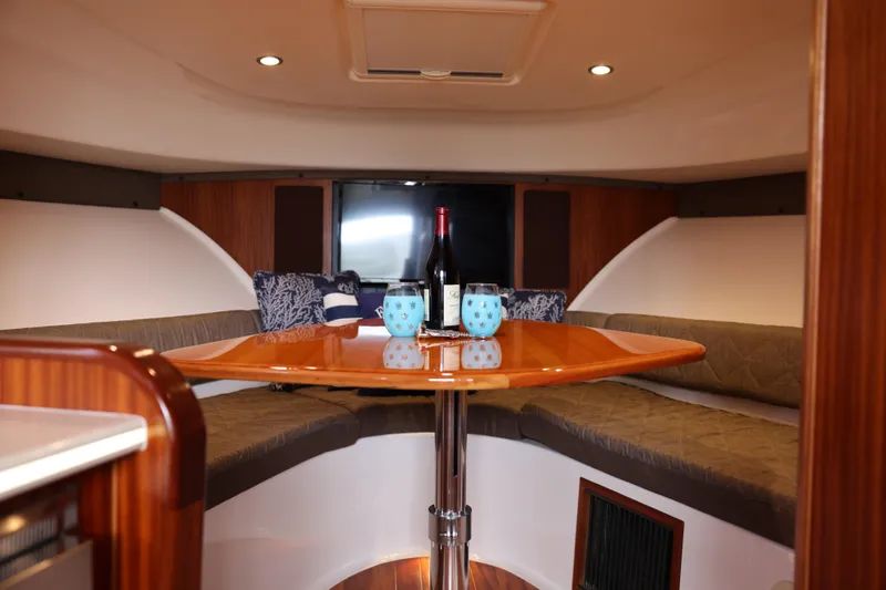 Slide: The Image of Helm of 2015 Pursuit OS 385 Offshore boat with Garmin navigation system. - 17