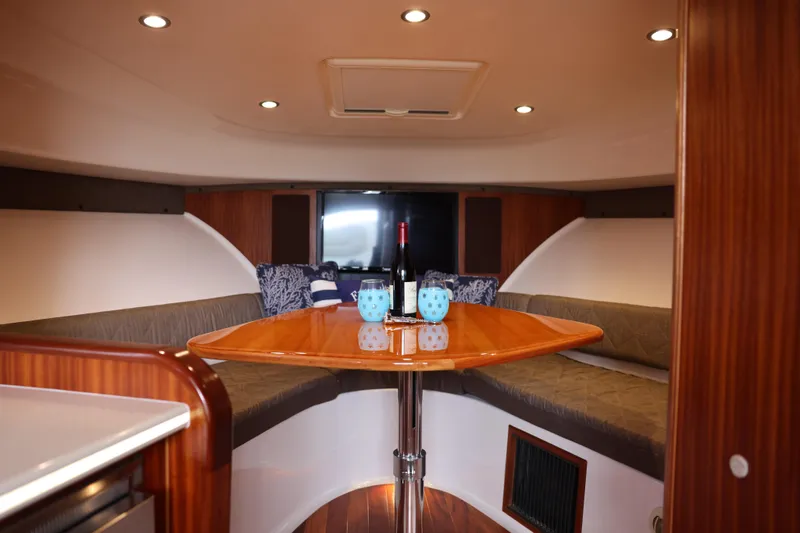 Slide: The Image of Helm of 2015 Pursuit OS 385 Offshore boat with Garmin navigation system. - 18