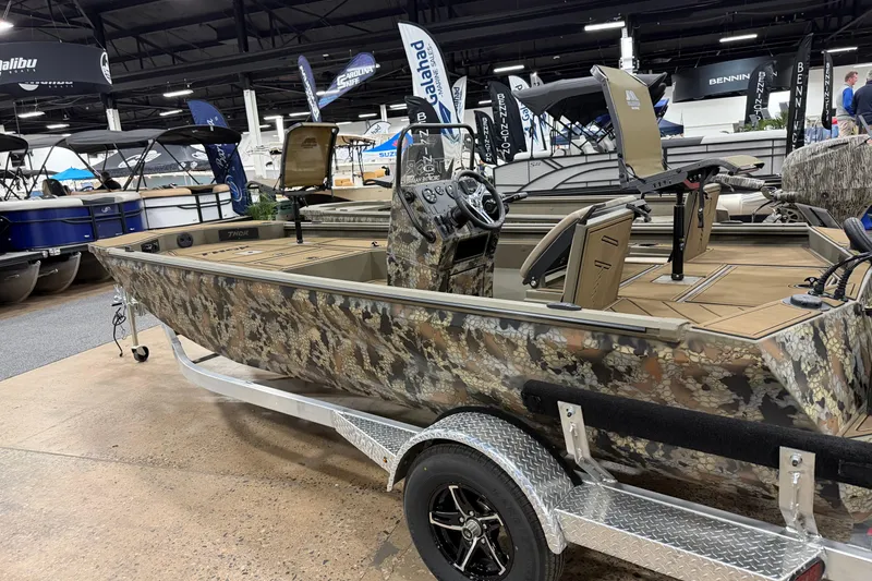 The Image of 2026 Thor Lake Hammer 1900 boat with camouflage design on display indoors. - 0