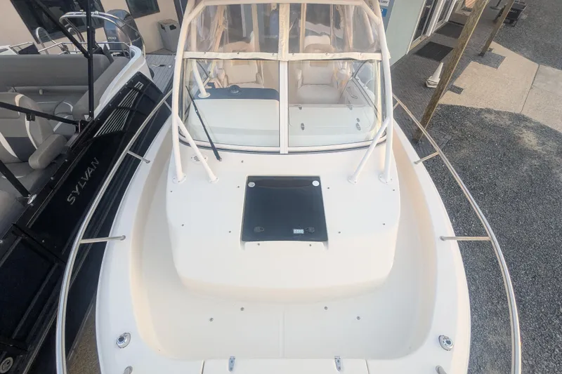 Slide: The Image of 2023 Grady-White Adventure 218 boat, top view of bow and cockpit area. - 2