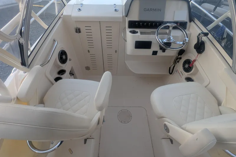 Slide: The Image of Interior of 2023 Grady-White Adventure 218 boat with Garmin navigation system. - 6