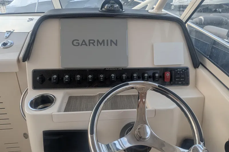 Slide: The Image of 2023 Grady-White Adventure 218 boat helm with Garmin navigation system. - 8