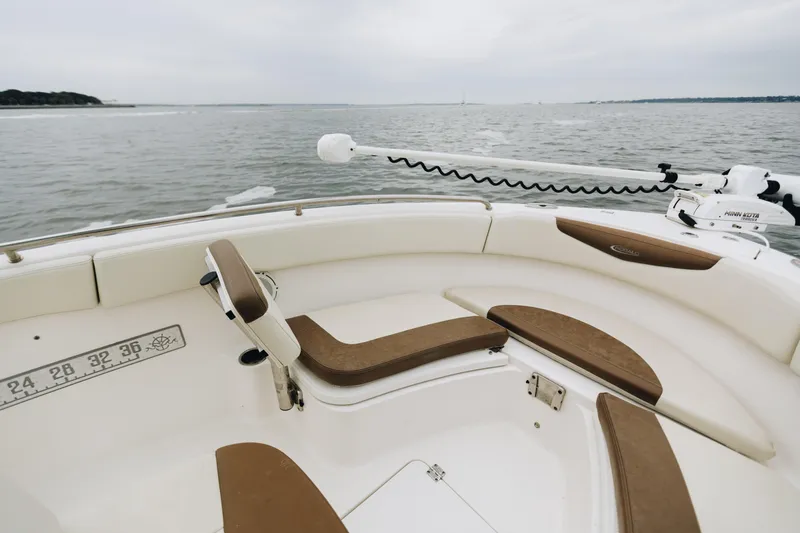 Slide: The Image of 2017 Robalo R222 Center Console boat interior with seating, on calm waters. - 8