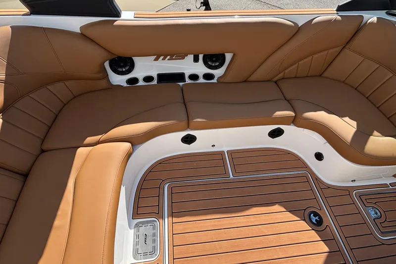 Slide: The Image of Luxurious interior of 2026 MB SPORTS F21 Classic boat with tan leather seating. - 11
