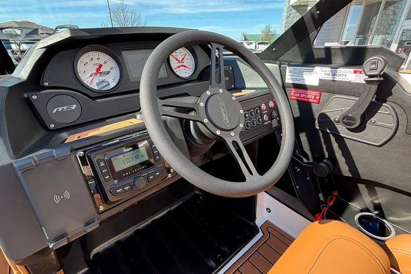 Slide: The Image of Interior view of 2026 MB SPORTS F21 Classic boat dashboard and steering wheel. - 17