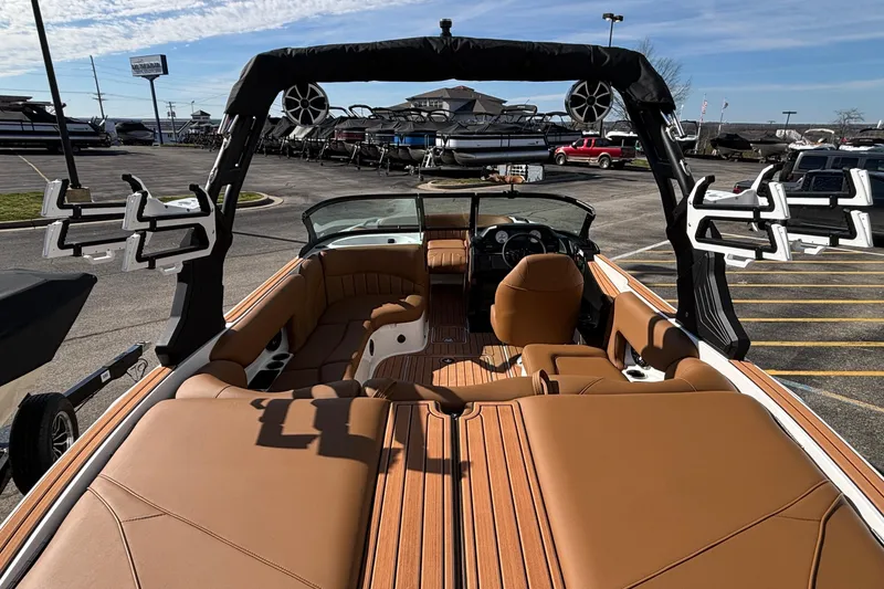 Slide: The Image of 2026 MB SPORTS F21 Classic boat interior with tan seating and modern design. - 3