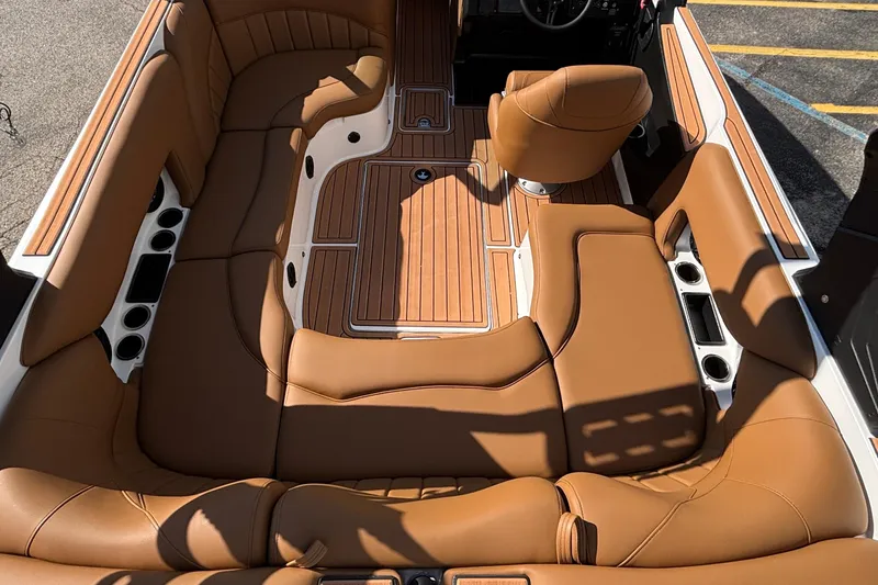 Slide: The Image of Luxurious interior of 2026 MB SPORTS F21 Classic boat with tan leather seating. - 4