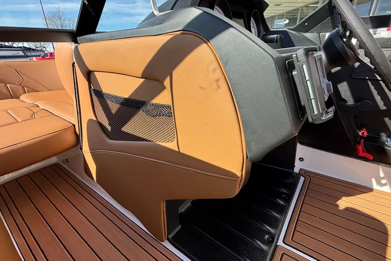 Slide: The Image of 2026 MB SPORTS F21 Classic interior with tan leather seats and wood flooring. - 40