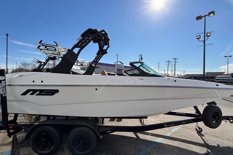 Slide: The Image of 2026 MB SPORTS F21 Classic boat on trailer under sunny sky. - 55