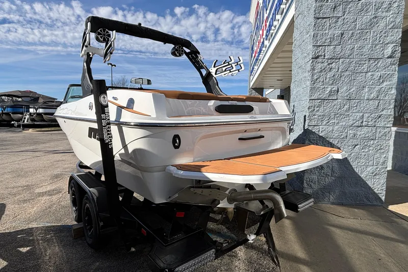 Slide: The Image of 2026 MB SPORTS F21 Classic boat on trailer, parked outside dealership. - 59
