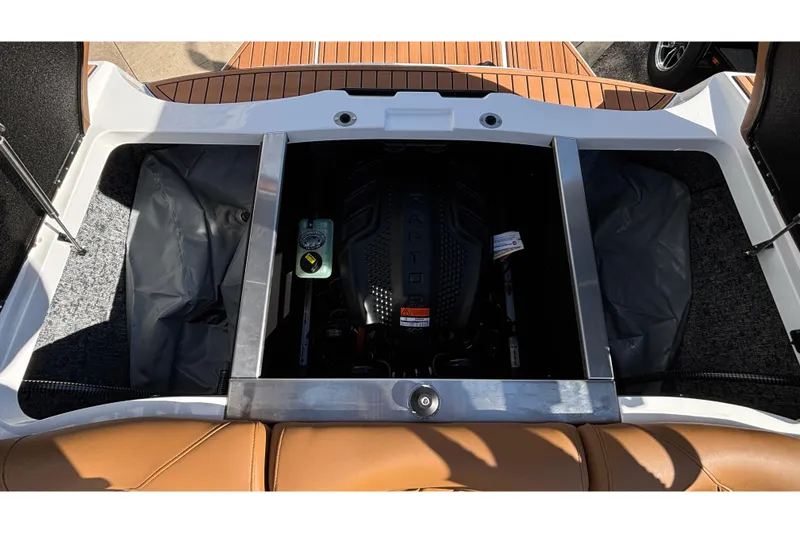 Slide: The Image of 2026 MB SPORTS F21 Classic boat engine compartment with visible Raptor engine. - 7