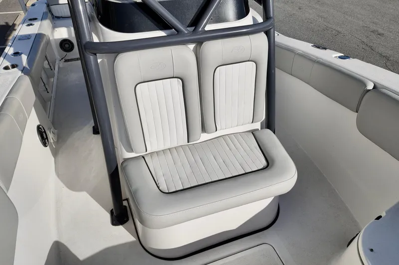 Slide: The Image of 2021 Sea Fox 248 Commander boat interior with cushioned seating and sleek design. - 10
