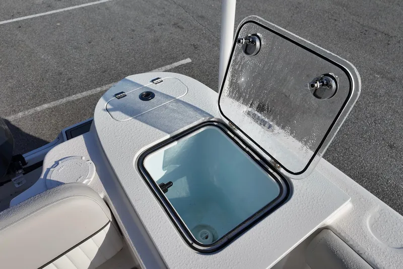 Slide: The Image of Open storage compartment on 2021 Sea Fox 248 Commander boat, showcasing interior details. - 12