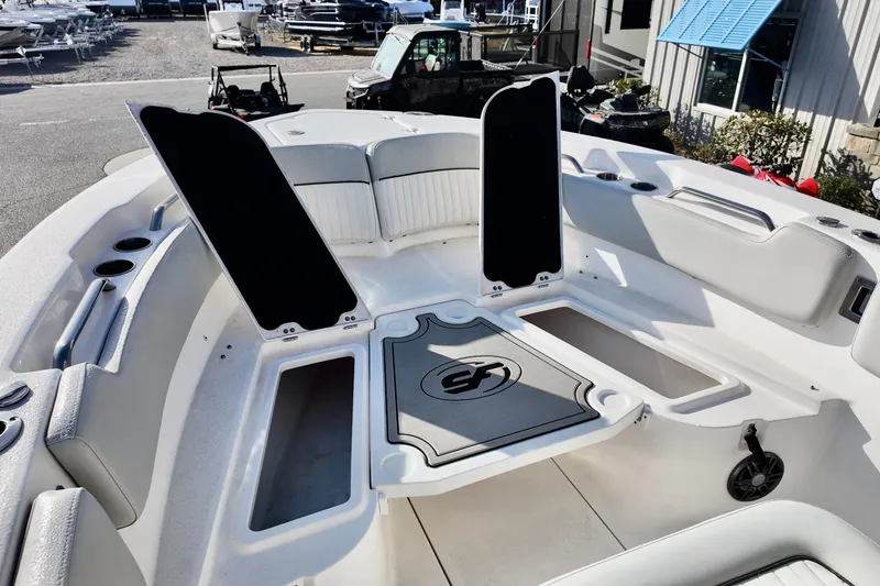 Slide: The Image of 2021 Sea Fox 248 Commander boat interior with open storage compartments and seating. - 15