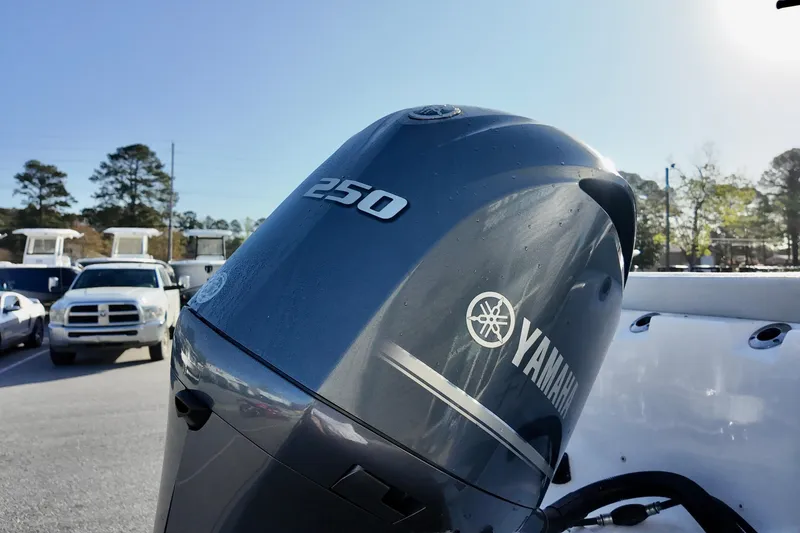 Slide: The Image of Yamaha 250 outboard motor on a 2021 Sea Fox 248 Commander boat, sunny day. - 16
