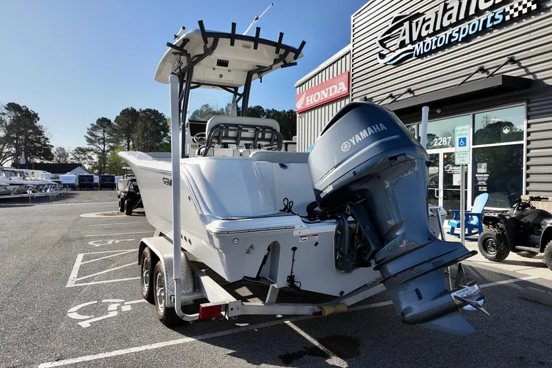 Slide: The Image of 2021 Sea Fox 248 Commander boat with Yamaha engine at dealership parking lot. - 3