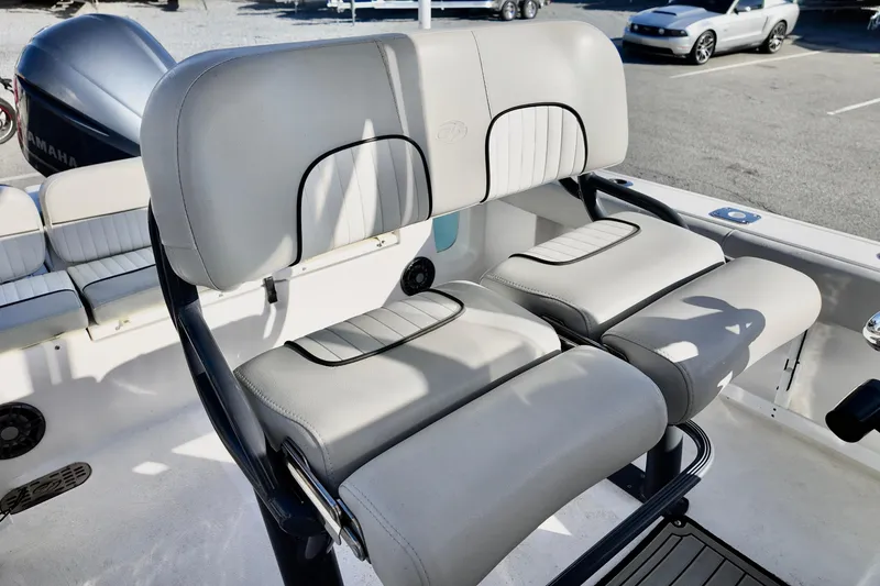Slide: The Image of 2021 Sea Fox 248 Commander boat seating with Yamaha engine in background. - 4