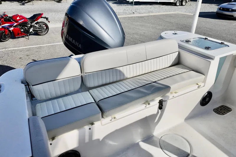 Slide: The Image of 2021 Sea Fox 248 Commander boat seating with Yamaha engine in background. - 5