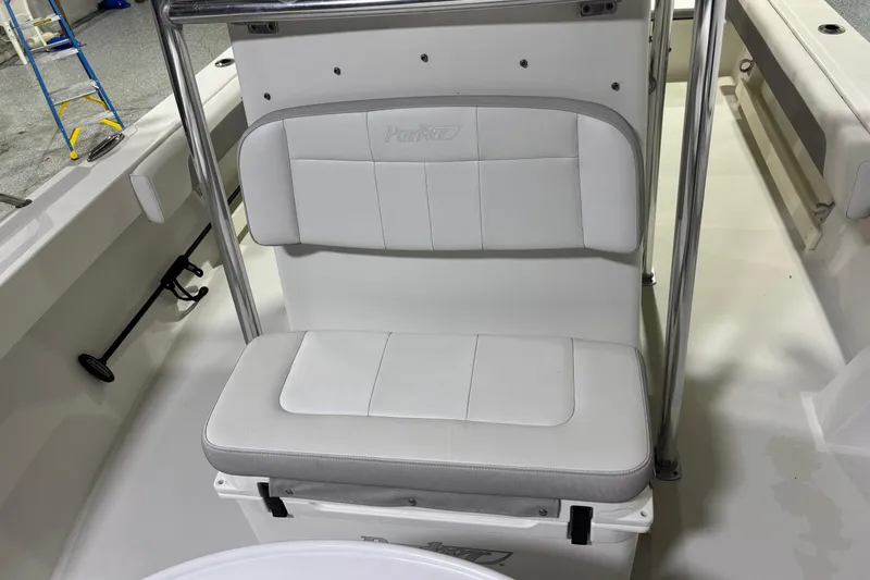 Slide: The Image of 2020 Parker 2100 Center Console boat seat with white cushioned upholstery. - 14