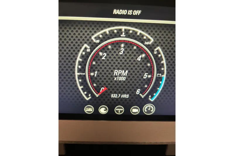 Slide: The Image of Dashboard of 2021 Malibu M240 showing RPM gauge and engine hours. - 21