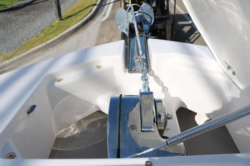 Slide: The Image of 2019 Robalo R247 Dual Console anchor system with chain and winch. - 8