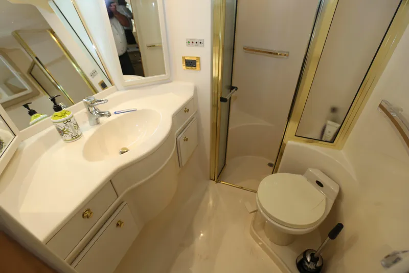Slide: The Image of Luxurious bathroom in 1999 Sea Ray 500 Sundancer yacht with shower and vanity. - 16