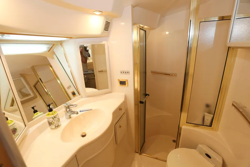 Slide: The Image of Luxurious bathroom in 1999 Sea Ray 500 Sundancer yacht with shower and vanity. - 17