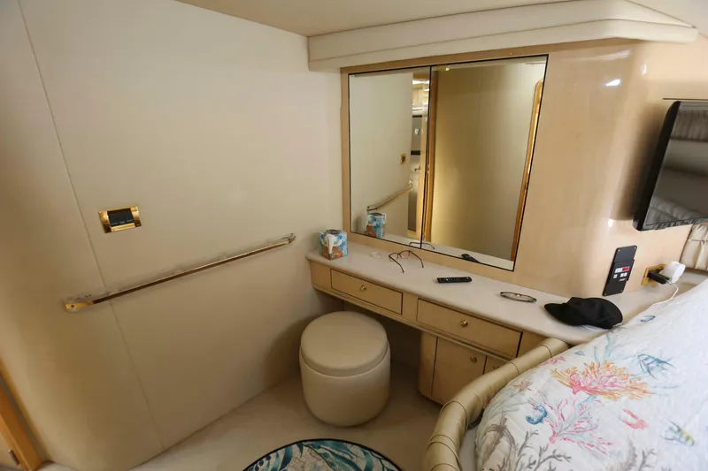 Slide: The Image of Interior of 1999 Sea Ray 500 Sundancer yacht with vanity, mirror, and stool. - 18