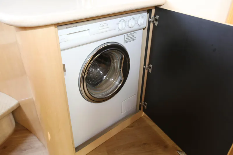 Slide: The Image of Washing machine inside 1999 Sea Ray 500 Sundancer yacht cabinet. - 21