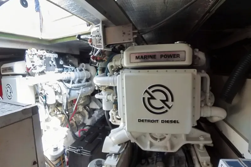 Slide: The Image of Engine room of a 1999 Sea Ray 500 Sundancer with Detroit Diesel marine power. - 27