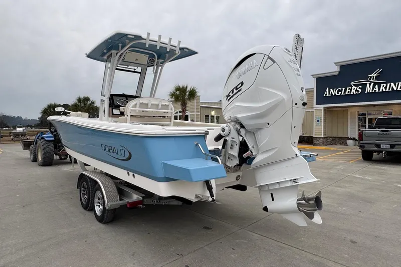 Slide: The Image of 2026 Robalo 266 Cayman boat on trailer at Anglers Marine dealership. - 4