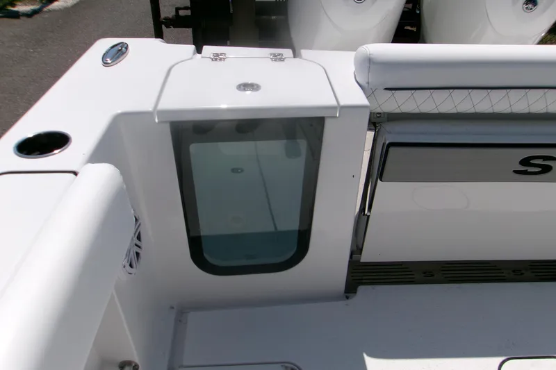 Slide: The Image of 2026 Sportsman Open 252 Center Console boat interior, featuring sleek design and modern amenities. - 11