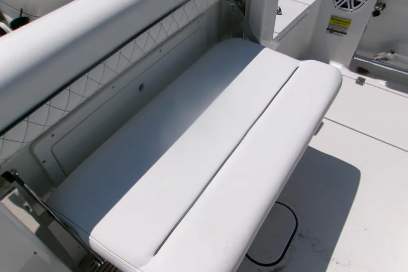 Slide: The Image of 2026 Sportsman Open 252 Center Console boat seat, white upholstery, sleek design. - 12