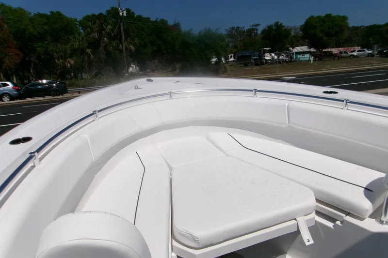 Slide: The Image of 2026 Sportsman Open 252 Center Console boat with spacious white seating area. - 15