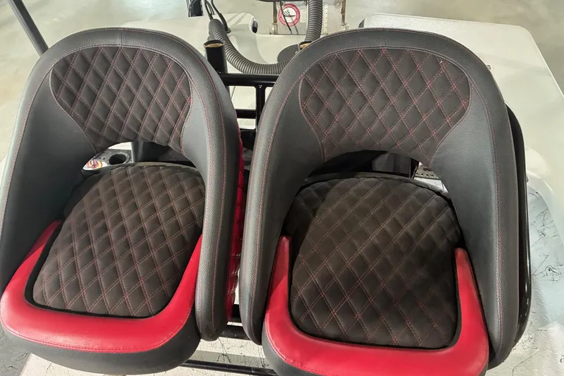 Slide: The Image of 2018 Majek 22 Xtreme boat seats with black and red diamond stitching. - 10