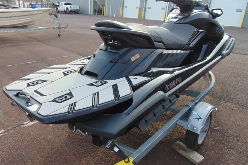 Slide: The Image of 2023 Yamaha WaveRunner FX SVHO on trailer, sleek design, parked outdoors. - 5
