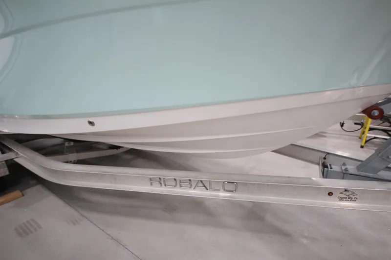 Slide: The Image of 2016 Robalo R200 Center Console boat on trailer in a garage. - 26