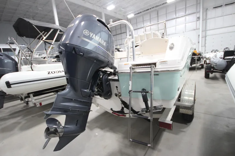 Slide: The Image of 2016 Robalo R200 Center Console boat with Yamaha outboard motor in showroom. - 28