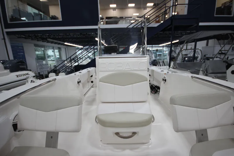 Slide: The Image of 2016 Robalo R200 Center Console boat interior with seating in showroom. - 38